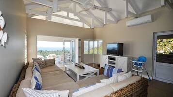 Basic Villa, 4 Bedrooms | Living area | Flat-screen TV