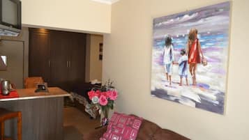 Family Room, 1 Bedroom | Living area | TV