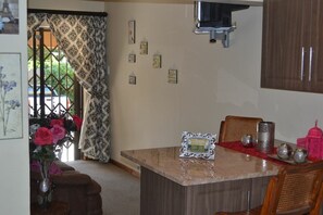 Family Room, 1 Bedroom | Living area | TV - Ikhanda Guesthouse (Mashishing)
