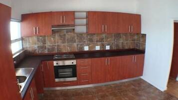 Departamento familiar, 3 habitaciones | Cocina privada