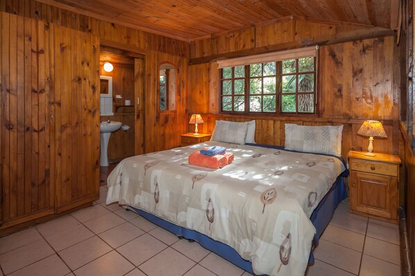 Hide-Away Cottage | Iron/ironing board, bed sheets - Woodlands Cottages & Camping (Kenton on Sea)