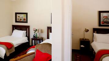 Quarto família | Ferros/tábuas de passar roupa, Wi-Fi de cortesia, roupa de cama