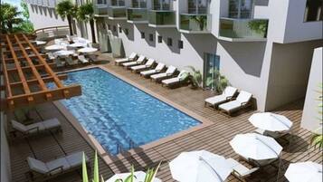 Outdoor pool, pool umbrellas, sun loungers