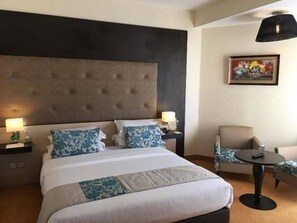 Deluxe Double Room | Free minibar items, in-room safe, desk, blackout drapes