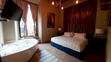 Suite de diseñador, 1 habitación, tina, planta baja | Ropa de cama de alta calidad y edredón