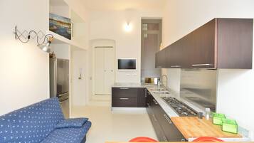 Apartemen Deluks | Area keluarga | TV layar datar
