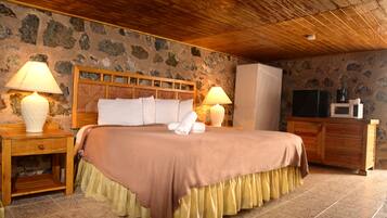 Habitación estándar, 1 cama King size, para no fumadores (Rock Walled Room) | Escritorio, wifi gratis y ropa de cama