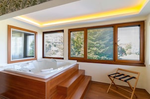 Quarto casal superluxo | Banheira de hidromassagem