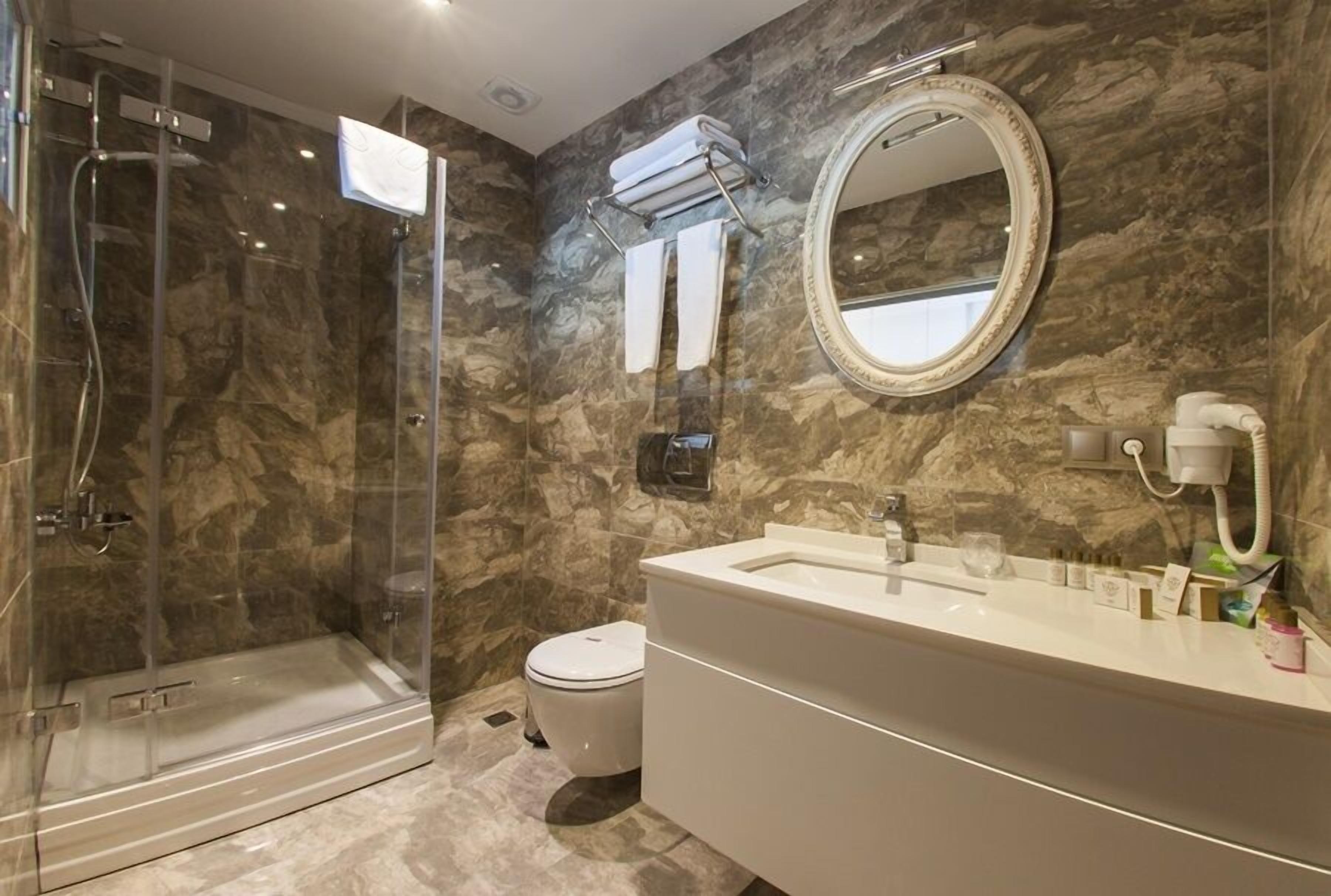 free toiletries, hair dryer, slippers, heated floors