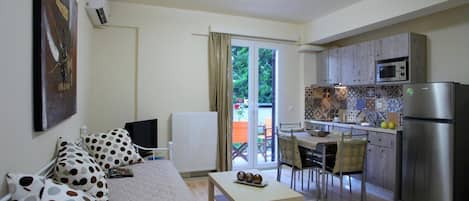 Apartment, 1 Bedroom | Living area | Plasma TV