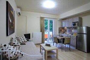 Apartment, 1 Bedroom | Living area | Plasma TV