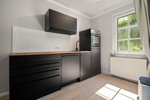 Casa, 1 quarto, terraço | Cozinha privada