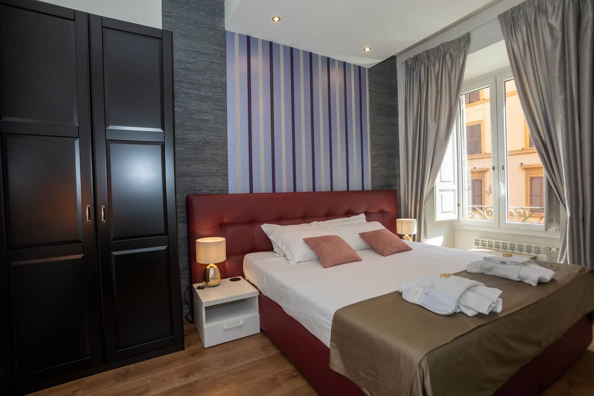 Superior Room | 1 bedroom, minibar, in-room safe, individually decorated