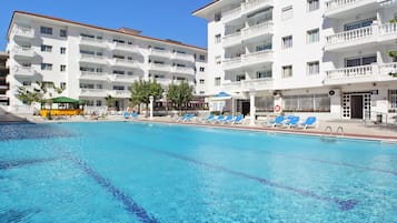 Relax by the pool with lounge chairs and umbrellas, or enjoy the views from your balcony.