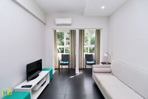 Lägenhet City - 2 sovrum - kök - utsikt mot staden | Vardagsrum | Tv