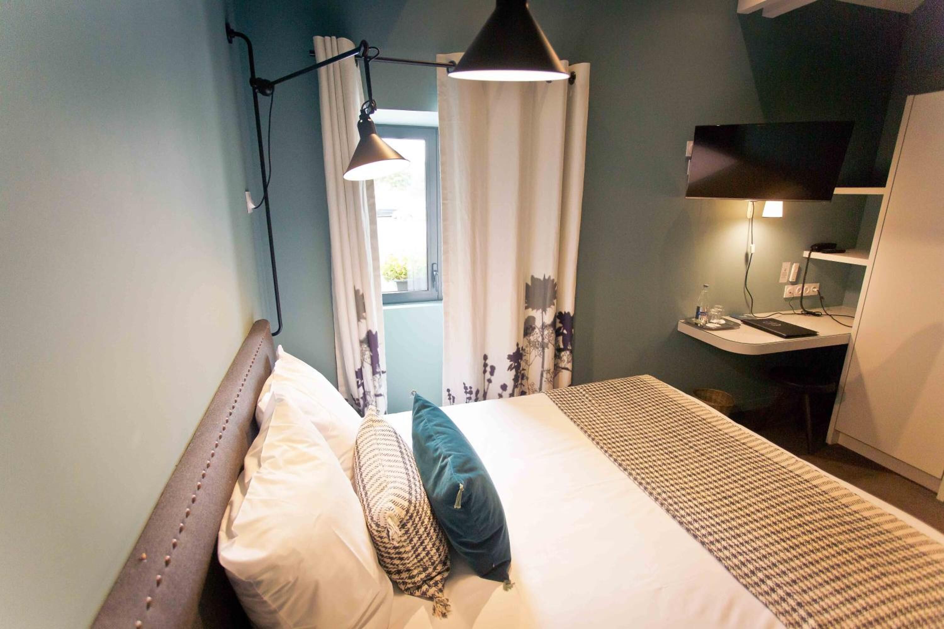 in-room safe, desk, iron/ironing board, free cots/infant beds