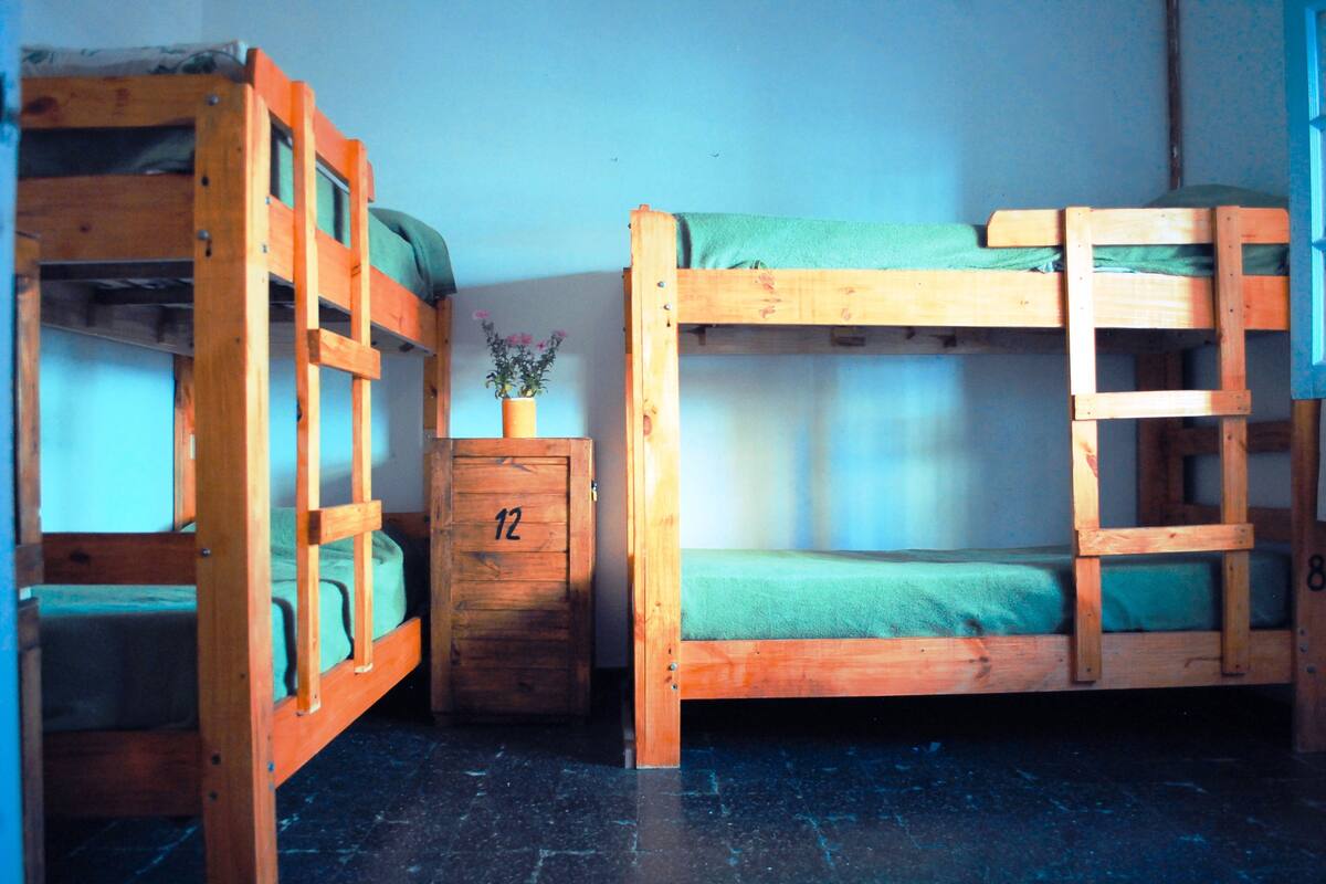 Individually decorated, individually furnished, desk, rollaway beds