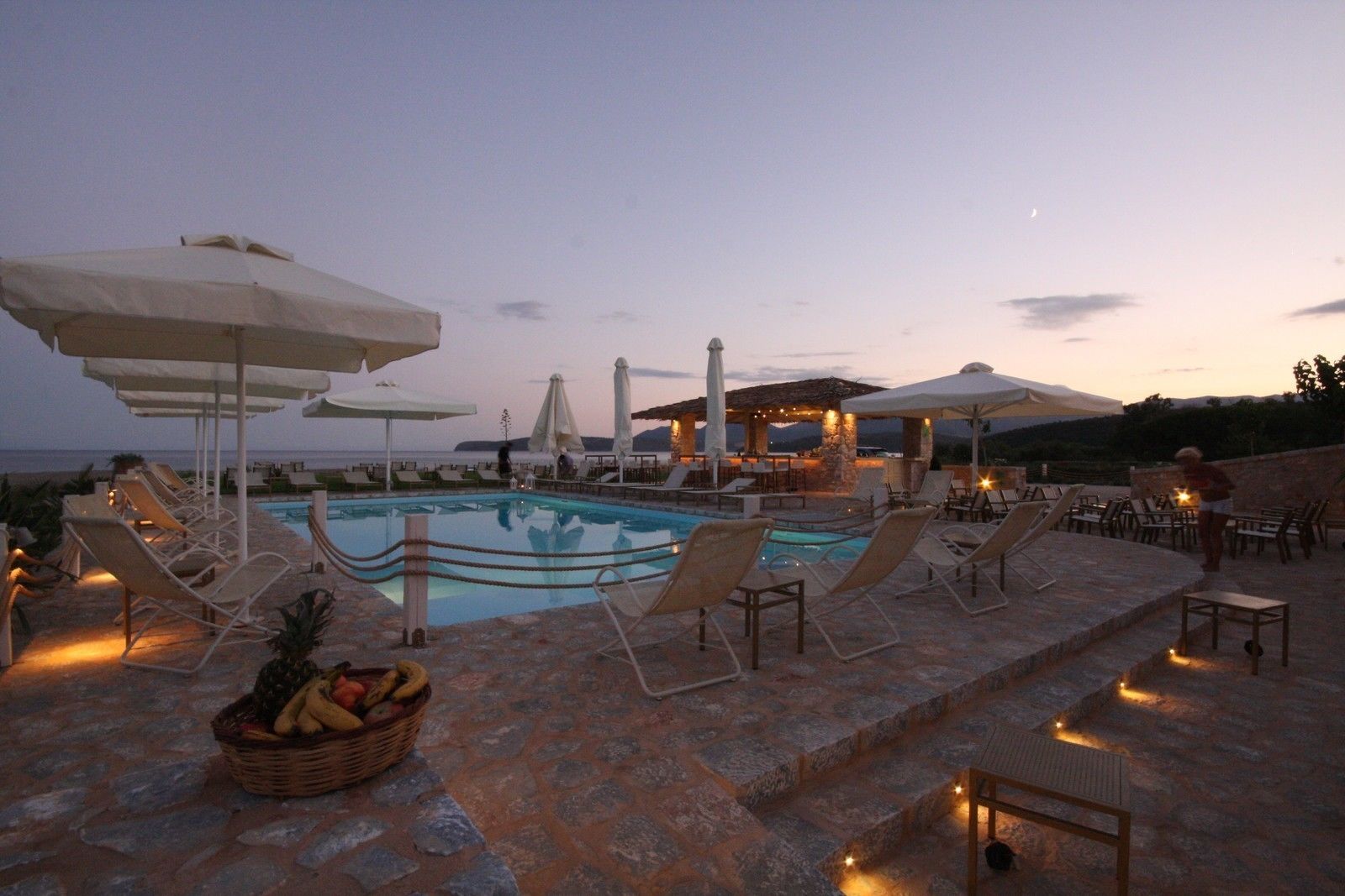 outdoor pool, pool umbrellas, pool loungers