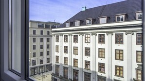 A multi-story building with a classical architectural style, featuring symmetrical windows and a central entrance. - Prize by Radisson, Xhibition Bergen City (Bergen)