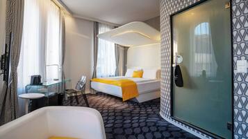 Premium bedding, pillow-top beds, blackout curtains, iron/ironing board