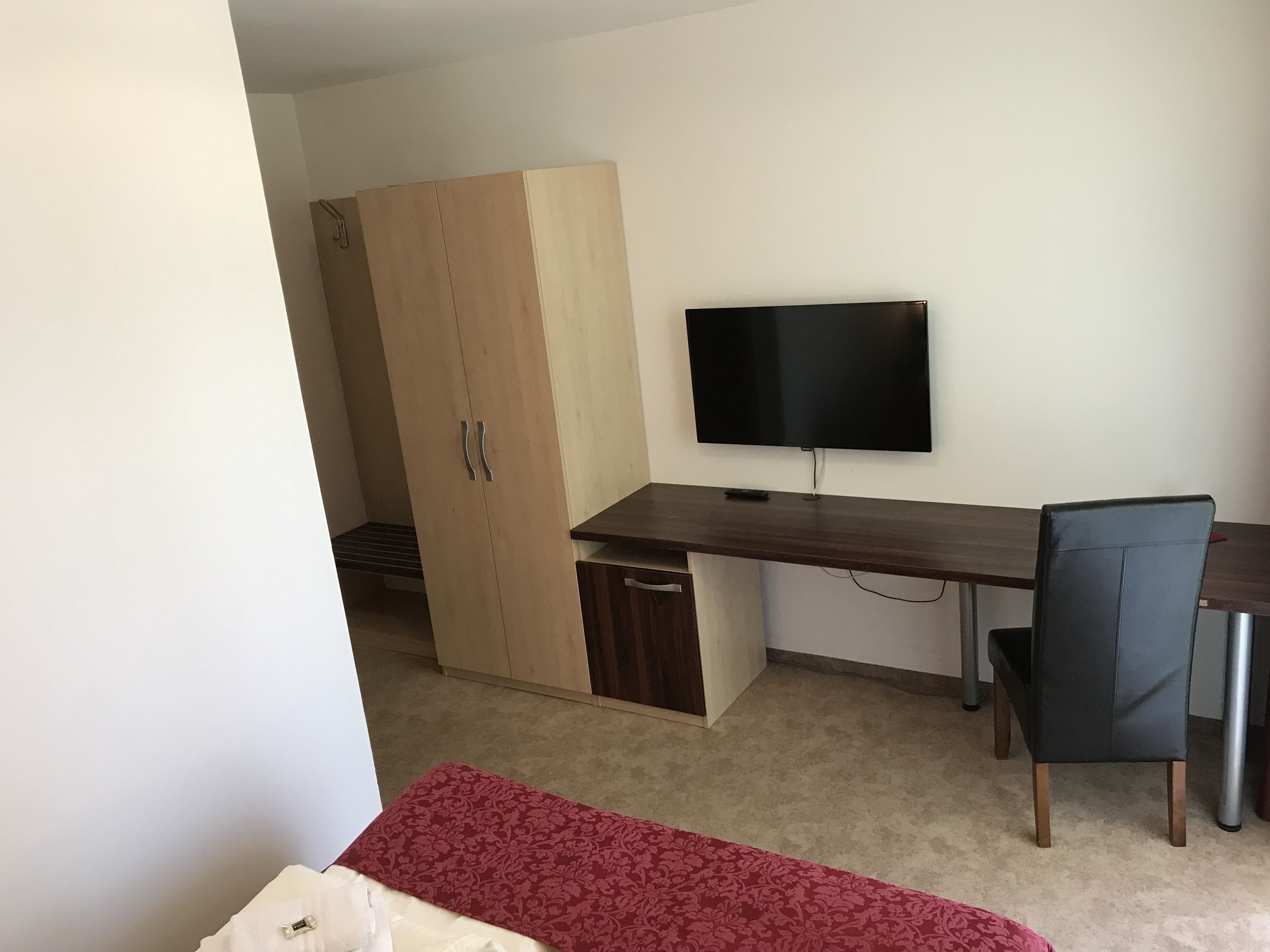 economy double room, 1 queen bed, refrigerator | 1 bedroom, desk, laptop workspace, soundproofing