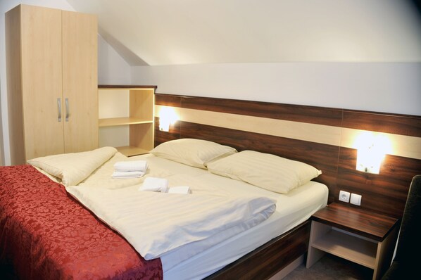 Classic Triple Room, Refrigerator | Room amenity