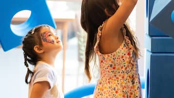 Children can play and explore the interactive outdoor play structure.