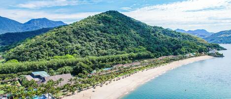 On the beach, sun loungers, beach umbrellas, beach towels