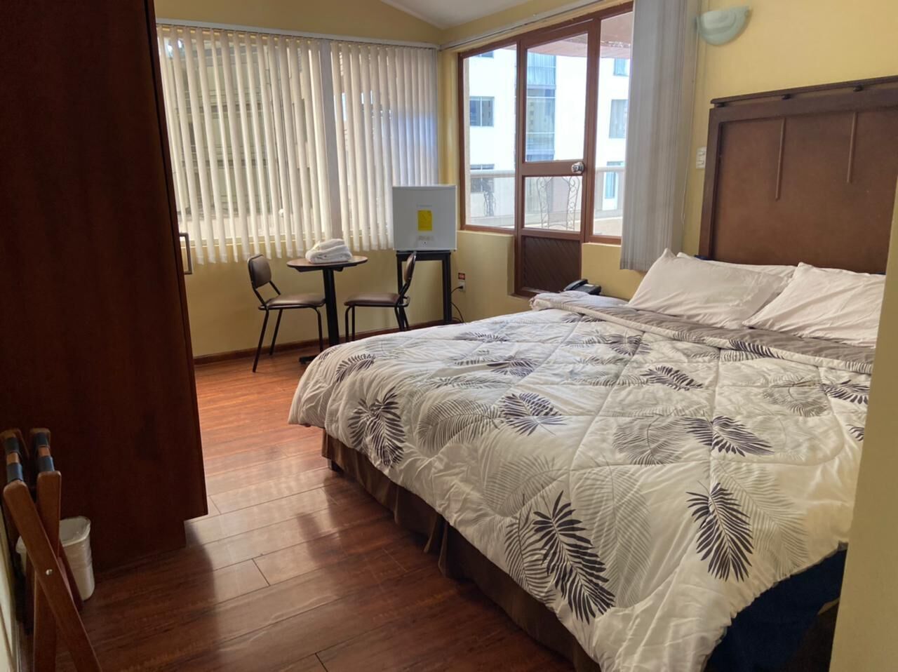 Minibar, desk, laptop workspace, iron/ironing board