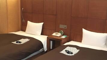 Habitación Deluxe con 2 camas individuales, para no fumadores | Escritorio, wifi gratis y ropa de cama