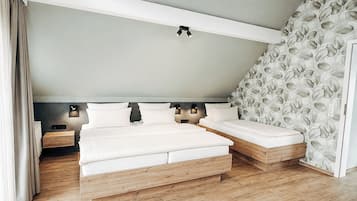 Familien-Suite, Balkon | Hochwertige Bettwaren, Minibar, Zimmersafe, kostenloses WLAN