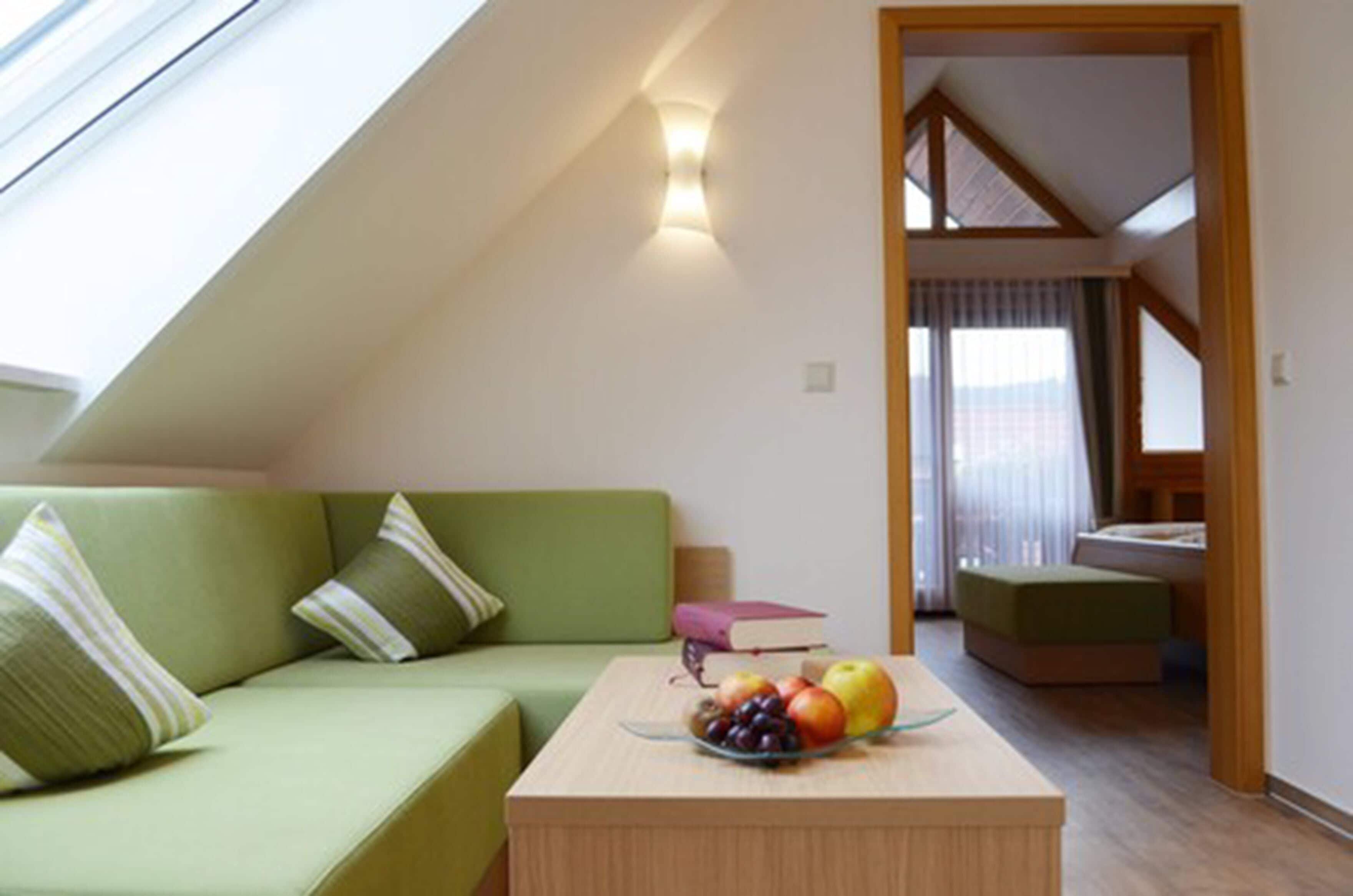 family suite, balcony | living room | flat-screen tv