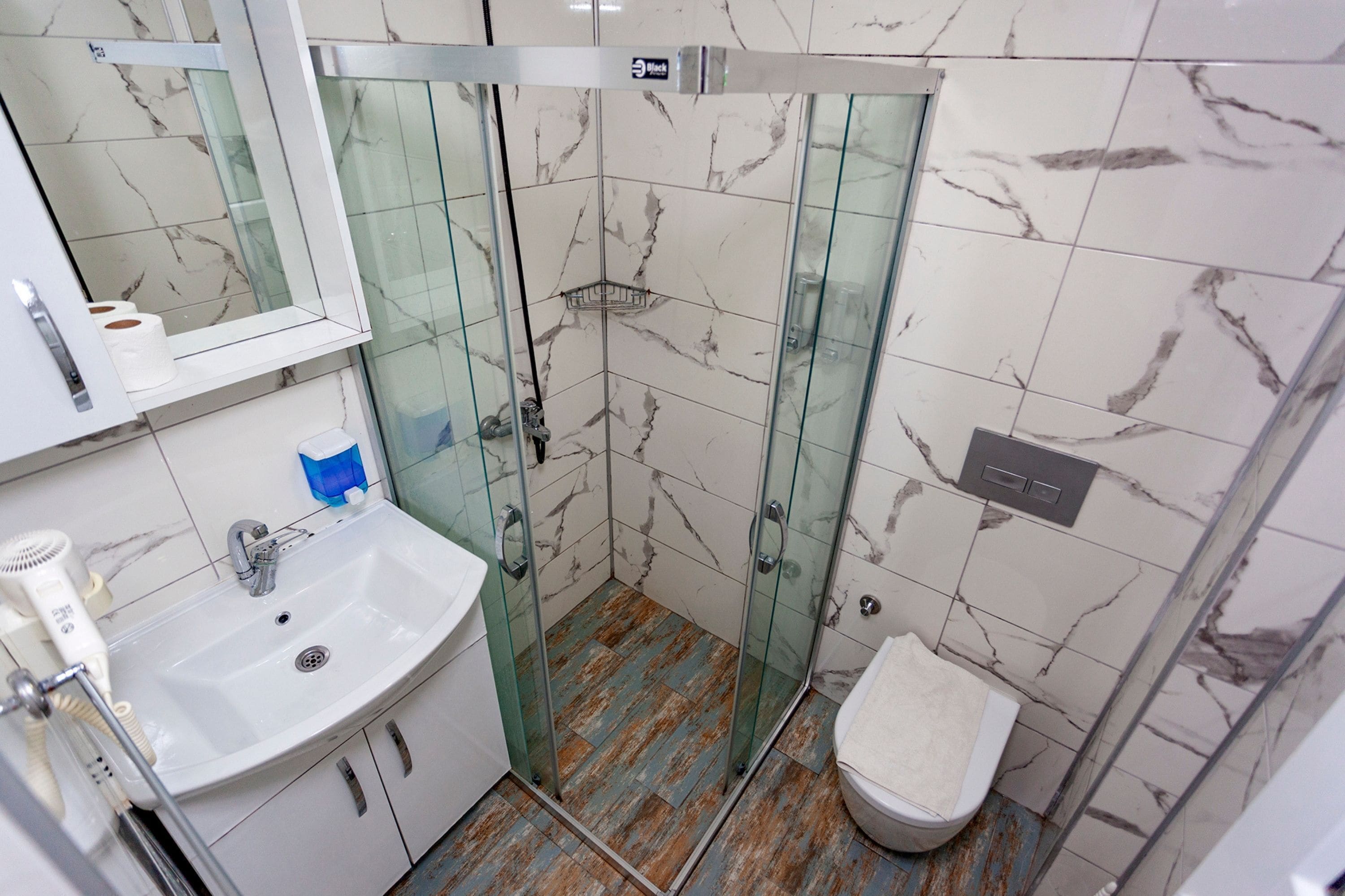 shower, free toiletries, hair dryer, slippers