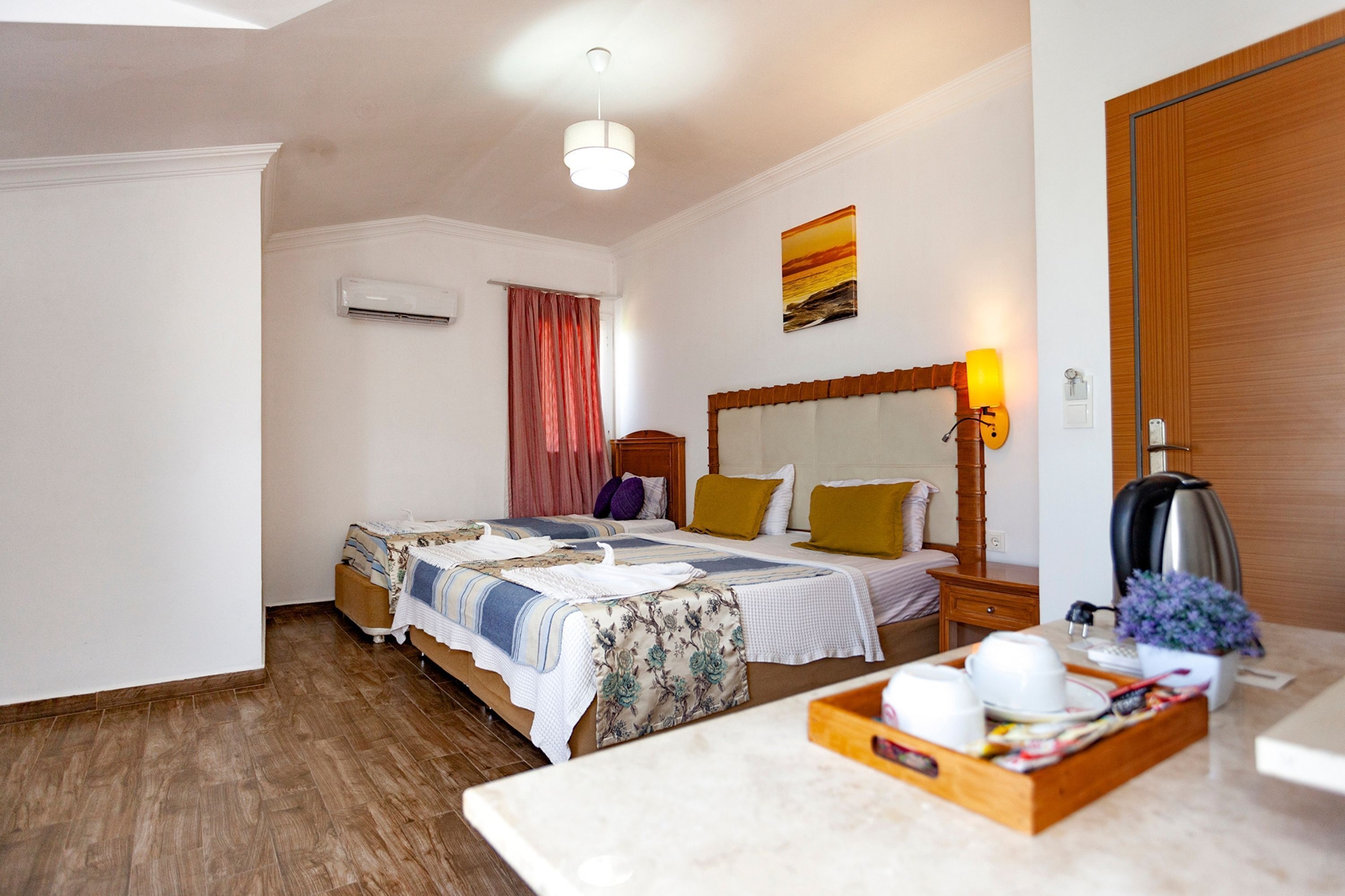family room | 1 bedroom, minibar, in-room safe, free wifi