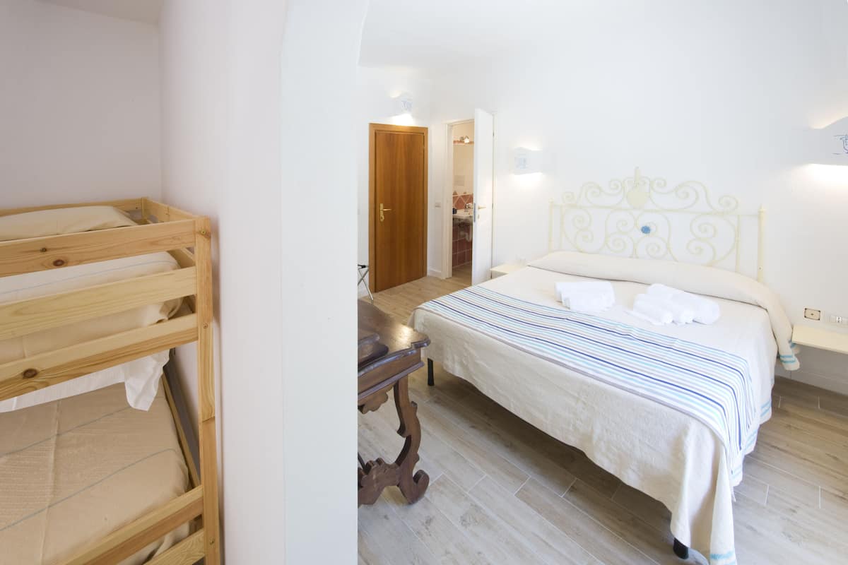 Quadruple Room | Premium bedding, minibar, in-room safe, desk