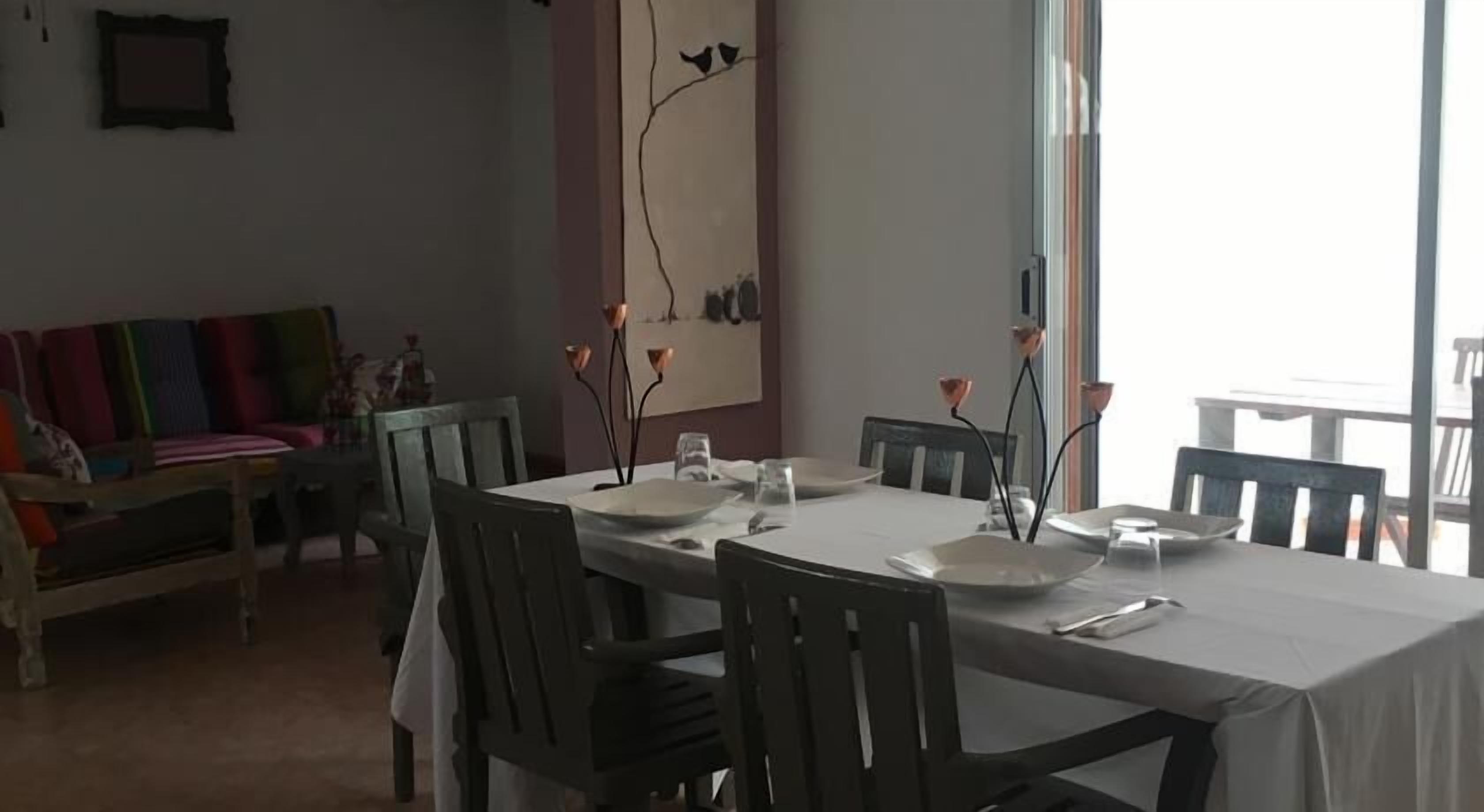 Breakfast, lunch, dinner served; local and international cuisine 