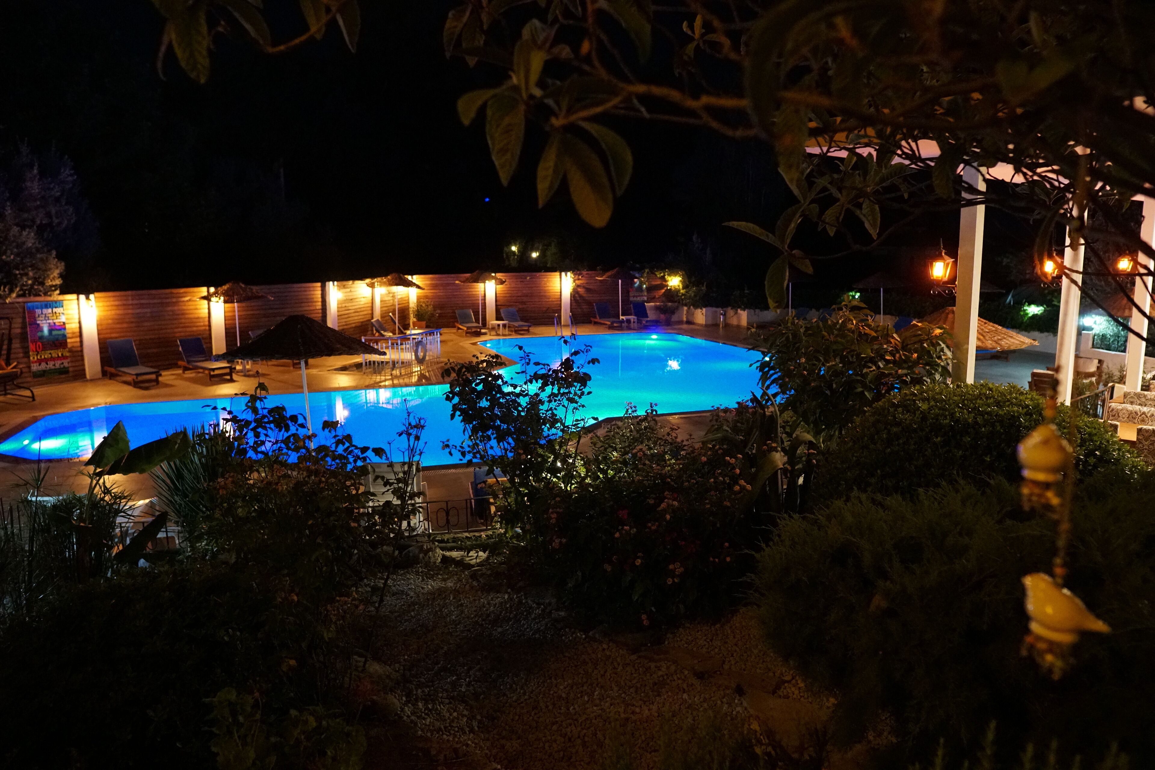 Seasonal outdoor pool, pool umbrellas, pool loungers