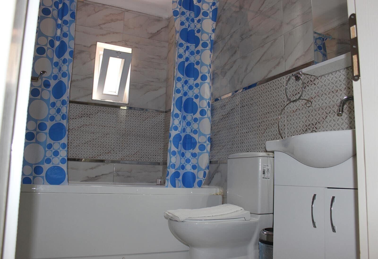 executive apartment | bathroom | shower, hair dryer, towels