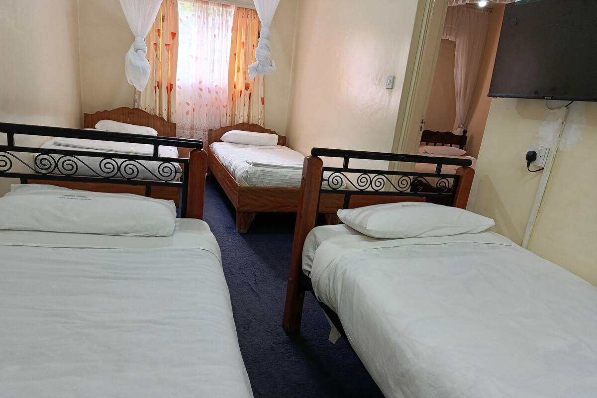 Family Room | In-room safe, desk, blackout drapes, free WiFi