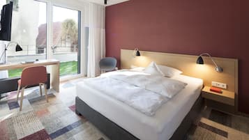 Habitación Deluxe doble | Ropa de cama hipoalergénica, caja fuerte, escritorio