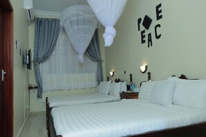 Twin Room | Egyptian cotton sheets, premium bedding, down comforters, minibar - Mowicribs Hotel & Spa (Entebbe)