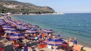 Private beach nearby, black sand, sun loungers, beach umbrellas