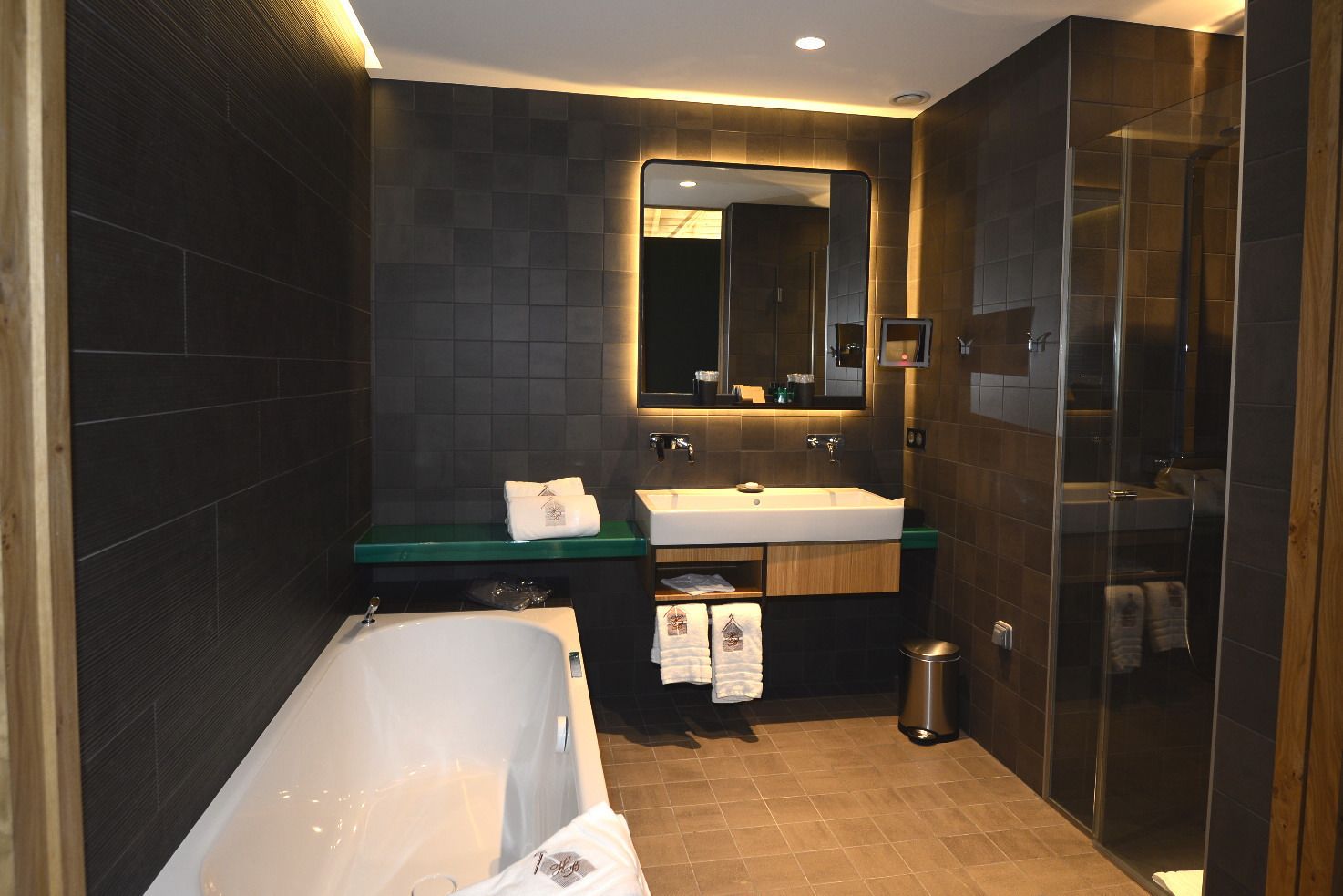 junior suite | bathroom | separate bathtub and shower, free toiletries, slippers, bidet