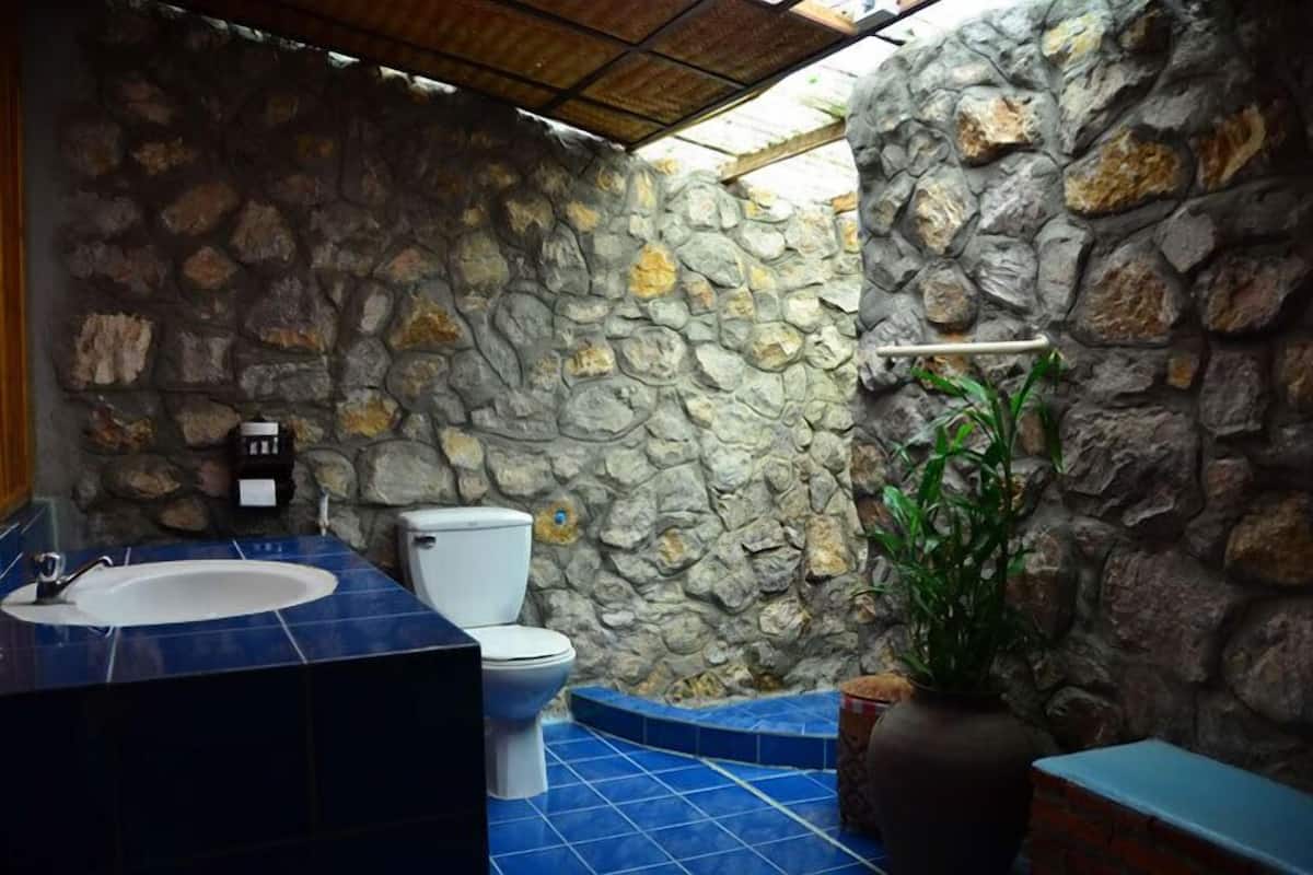 bungalow with river view  | bathroom | shower, free toiletries, hair dryer, slippers