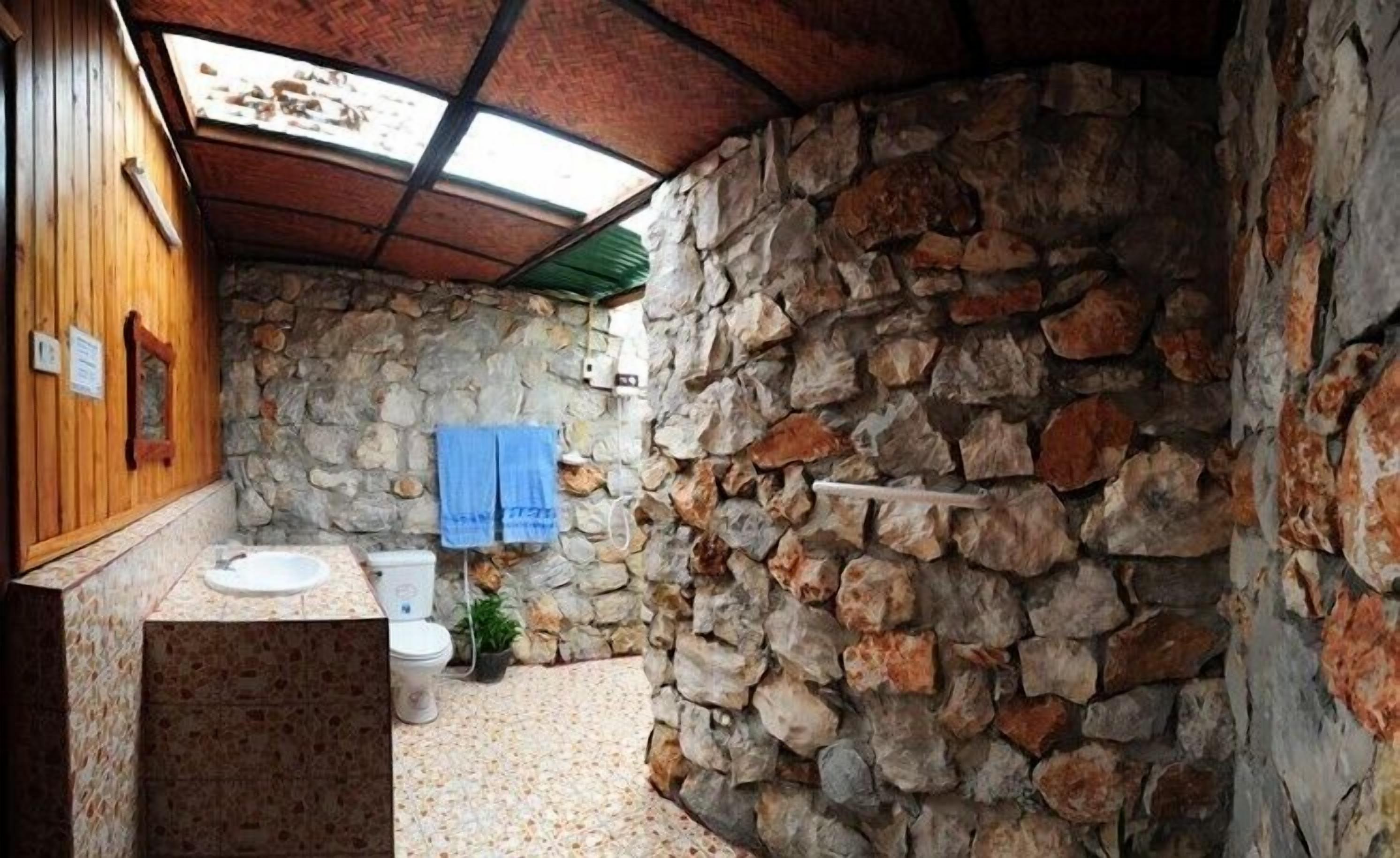 bungalow with garden view  | bathroom | shower, free toiletries, hair dryer, slippers