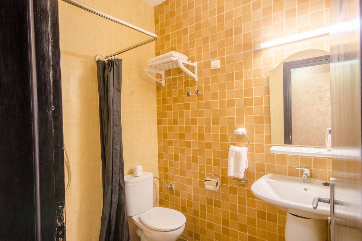 shower, rainfall showerhead, towels