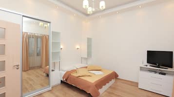 Apartamento, 1 quarto (Studio) | Sala de estar | TV de tela plana