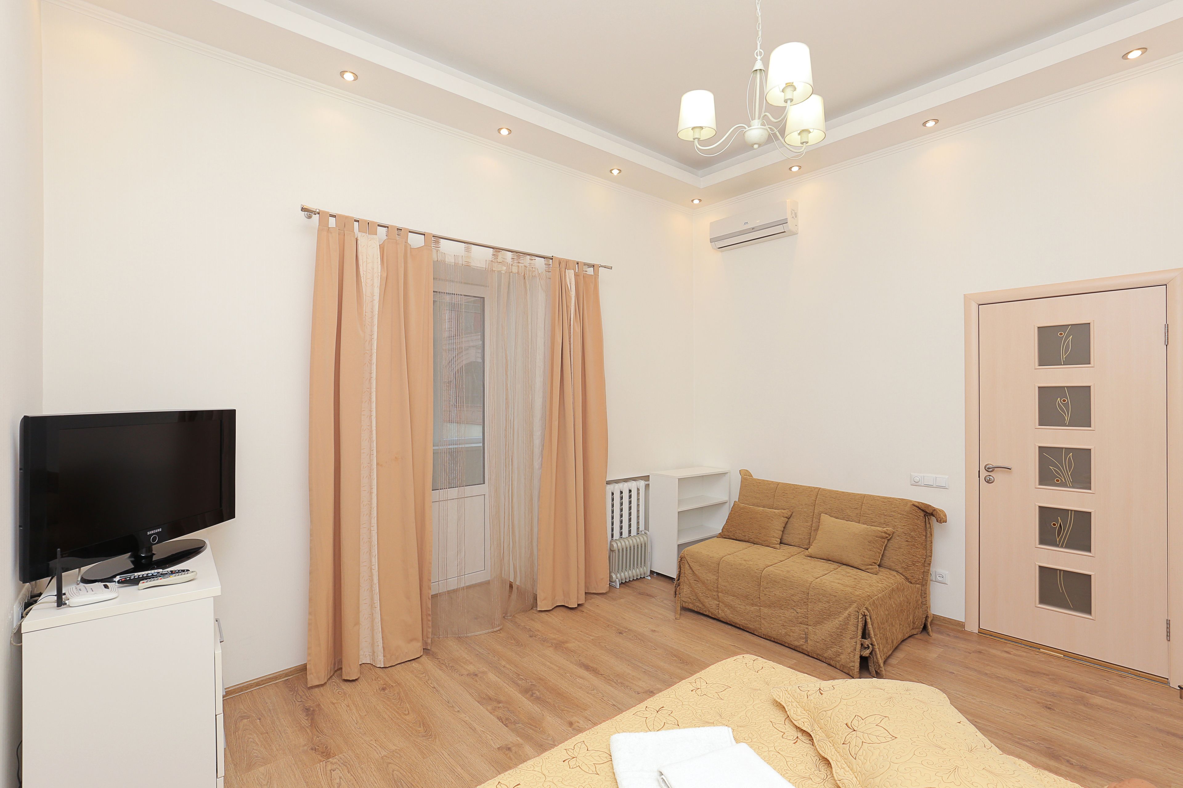 Apartamento, 1 quarto (Studio) | Área de estar | TV de tela plana