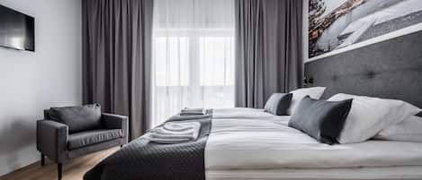 Blackout drapes, iron/ironing board, free WiFi, bed sheets