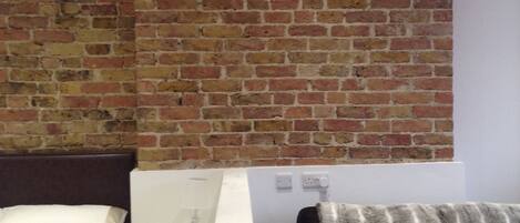 Deluxe Apartment, 1 Bedroom | Living area | Flat-screen TV